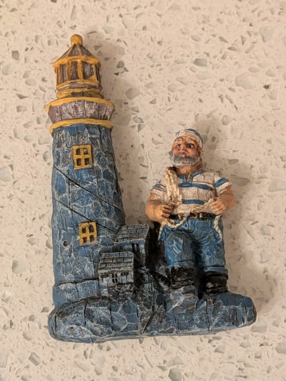 Nautical Refrigerator Magnet Featuring a Blue Lighthouse and A Sea Captain